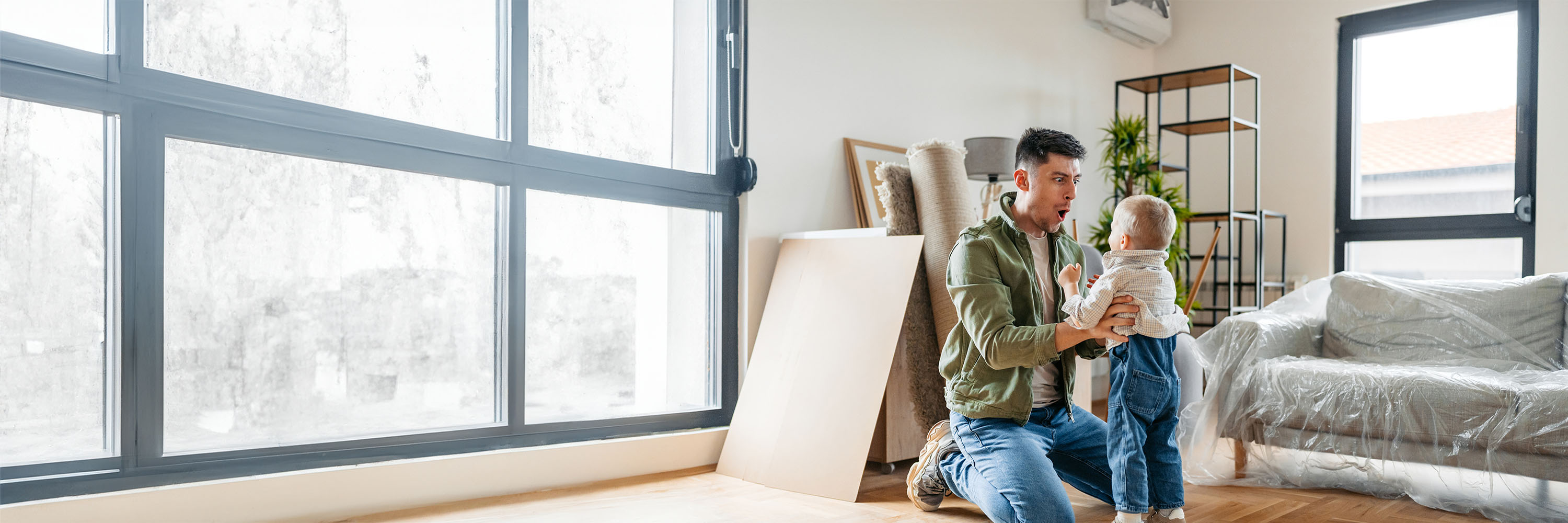 Man and baby in apartment