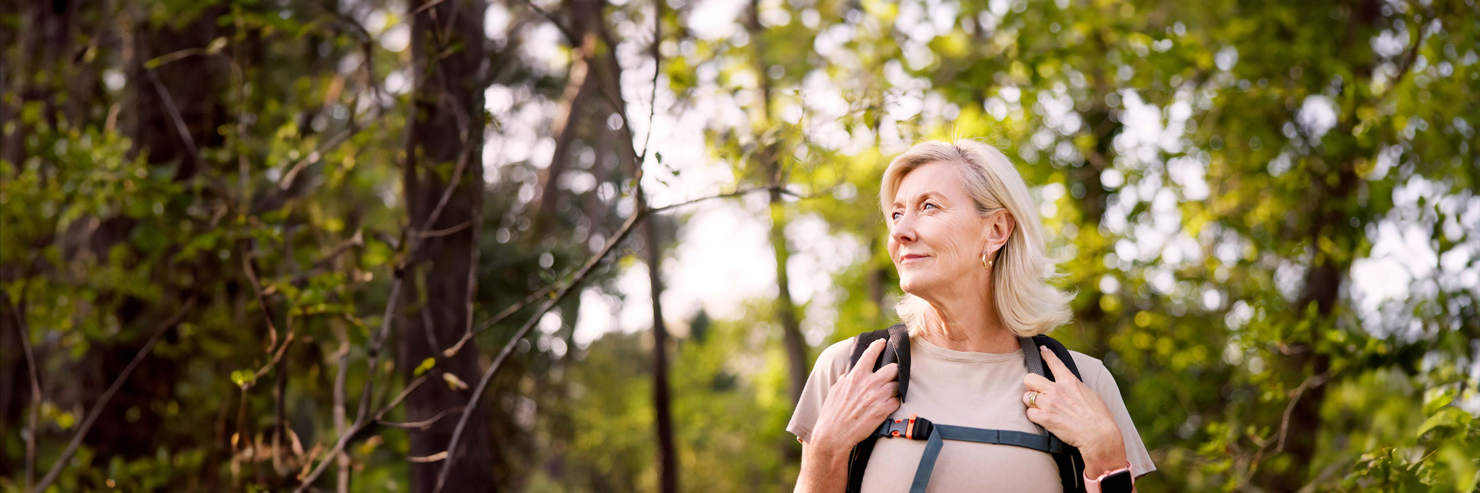 Woman hiking in forest