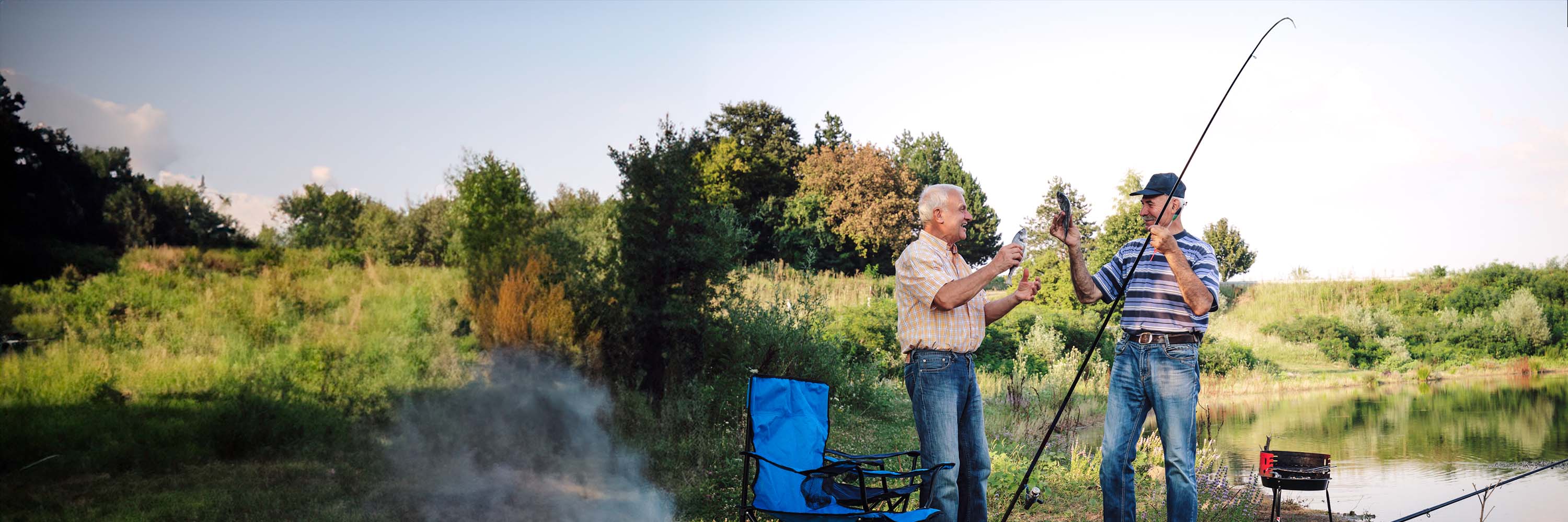 Two older men fishing