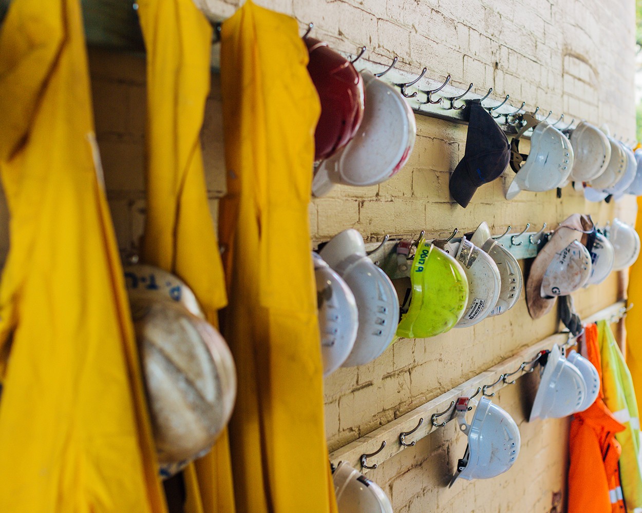 A wall of hard hats