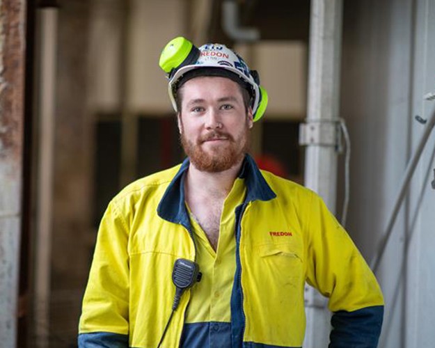 Man in yellow high vis workwear