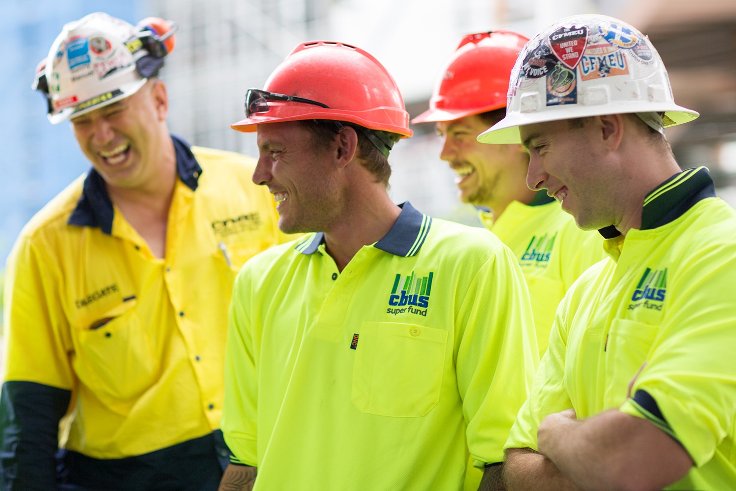 group of tradies laughing