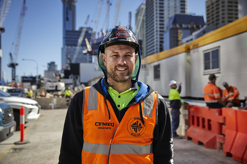 male tradie smiling in camera