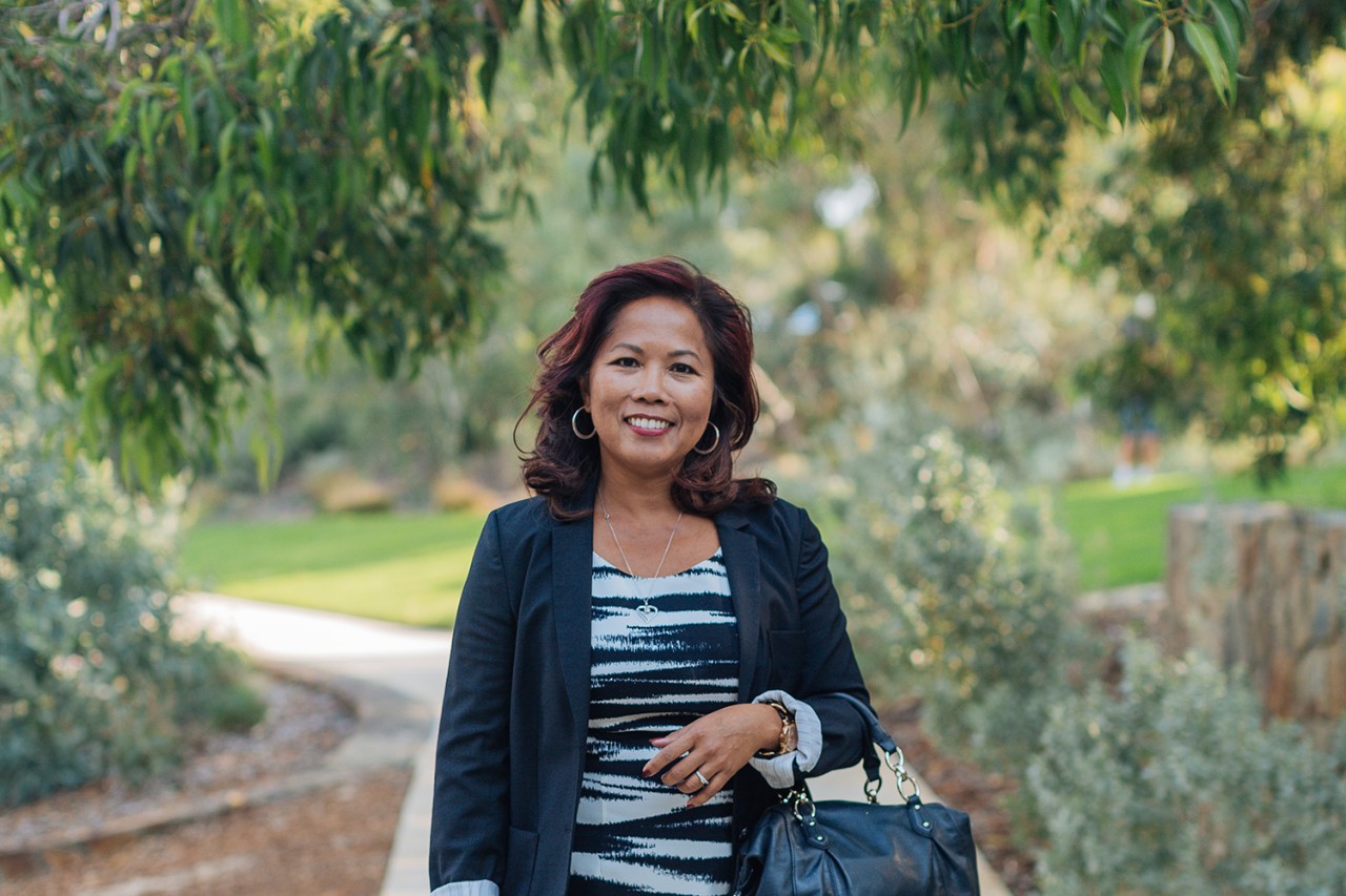 A lady walking in a park