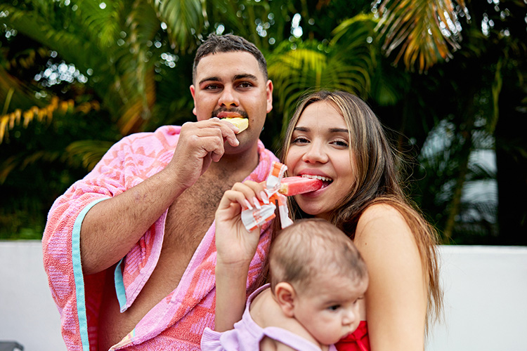 Young family eating ice creams