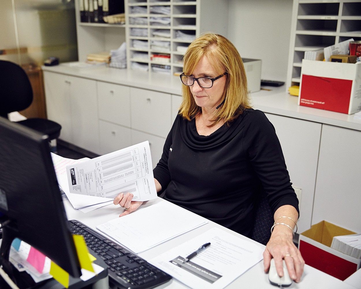 A woman working at a computer