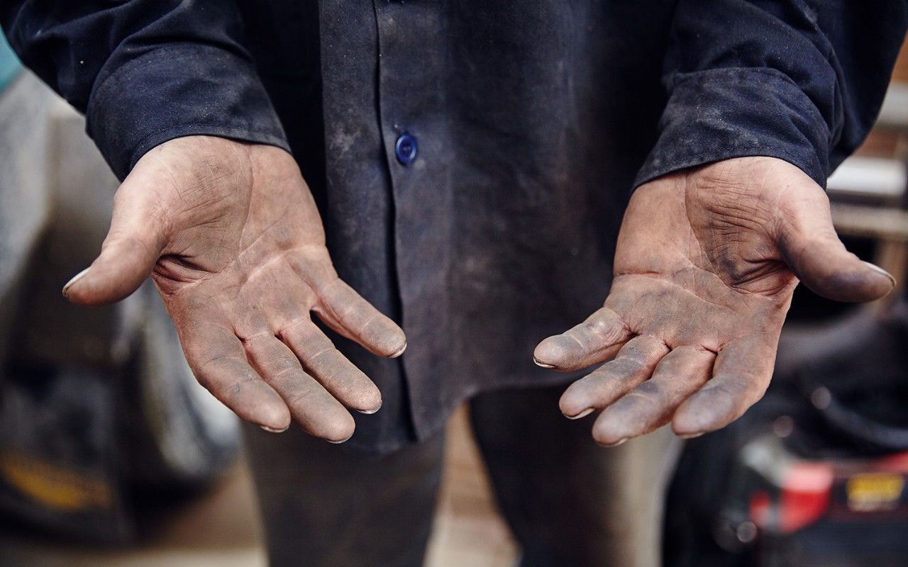 Man showing dirty hands