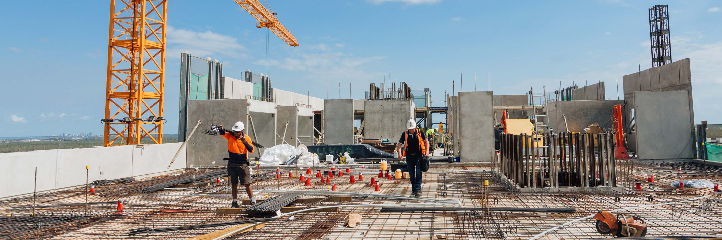 Cbus worker smiling while on job site